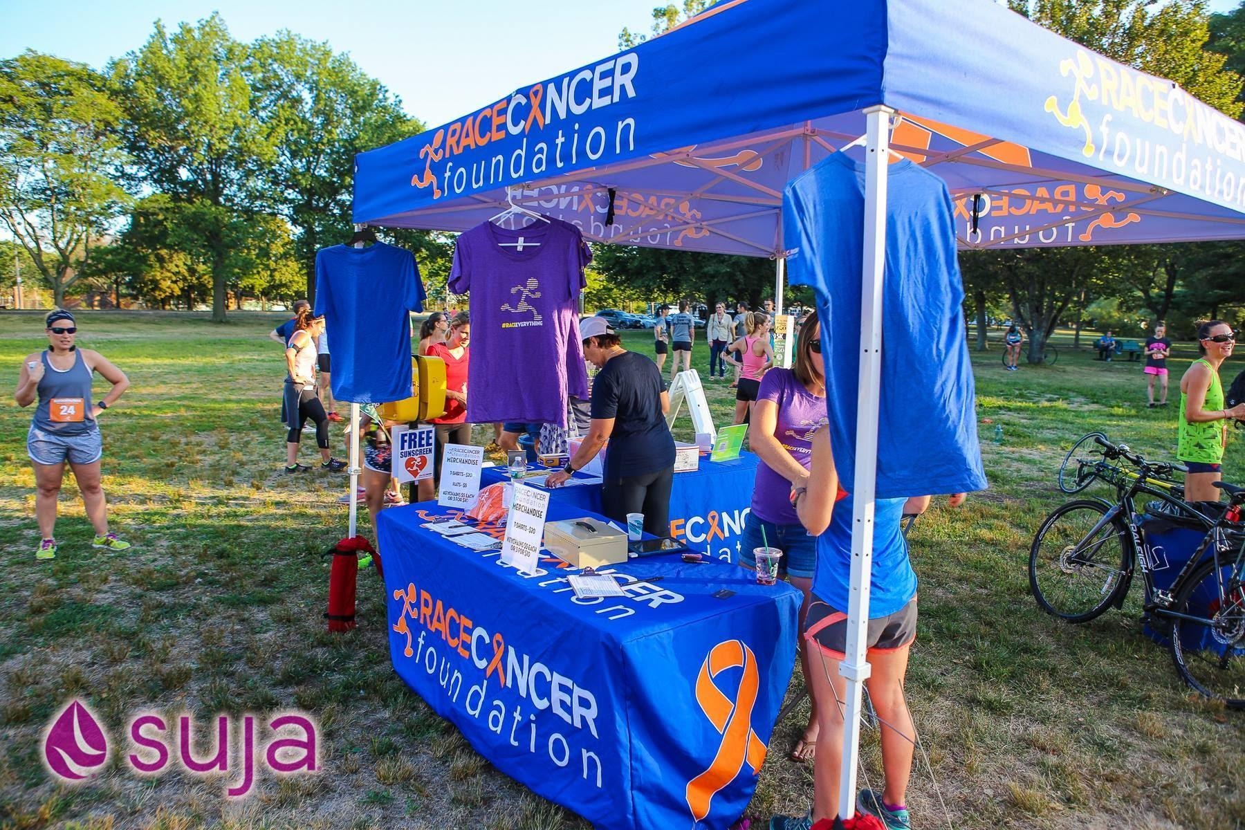 RACE CANCER FOUNDATION 10x10 Premium Splash Tent digitally printed with 6ft fitted table cover with logos by splashtents.com 
