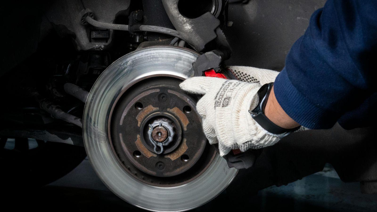 worn brake pads, brake pad dangers, brake failure risks, brake pad replacement, brake system safety, car brake maintenance, signs of worn brakes, brake pad inspection, brake safety tips, brake repair services
